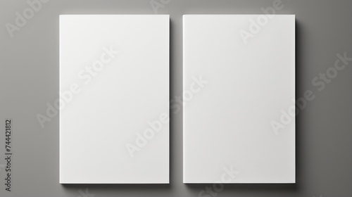 Brochures or two blank white pages side by side top-down isolated in a grey background. Generative ai photo