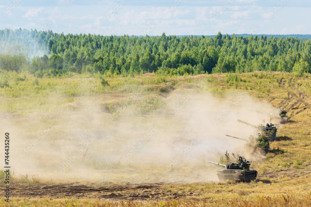 Interer Tank Driving Set Heavy combat vehicles tanks drive around the butts and put up a smoke ...
