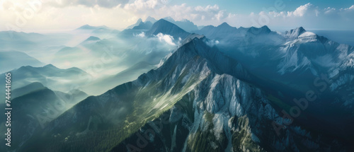 Aerial view of mountain range with clouds