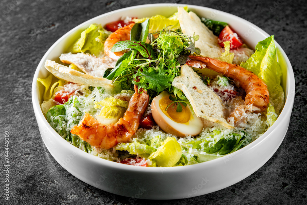 Caesar salad with croutons, cheese, eggs, shrimp, tomatoes and grilled chicken Caesar salad with croutons, cheese, eggs, shrimp, tomatoes and grilled chicken