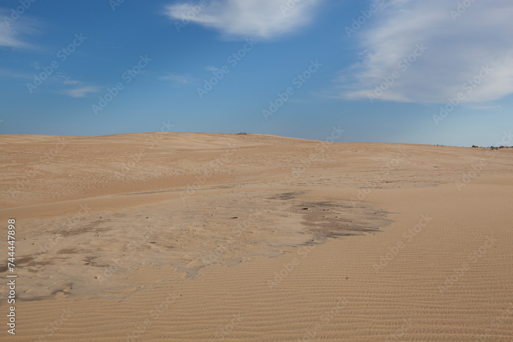 A scenic view of sand dunes at Jockey's Ridge State Park in the Outer Banks in North Carolina.