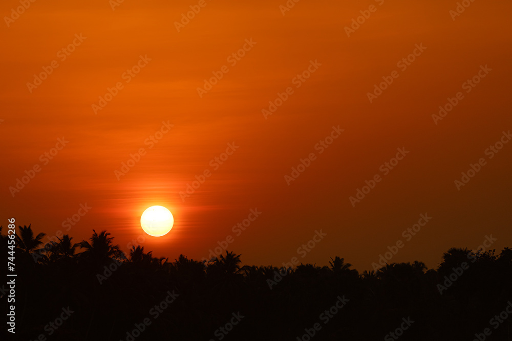 Fototapeta premium A Beautiful sunset landscape in the late winter in south india
