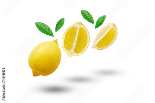 Flying yellow lemon with slices and green leaf isolated on white background.