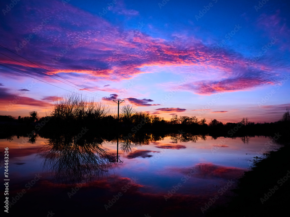 purple sunset above river purple sunset above river