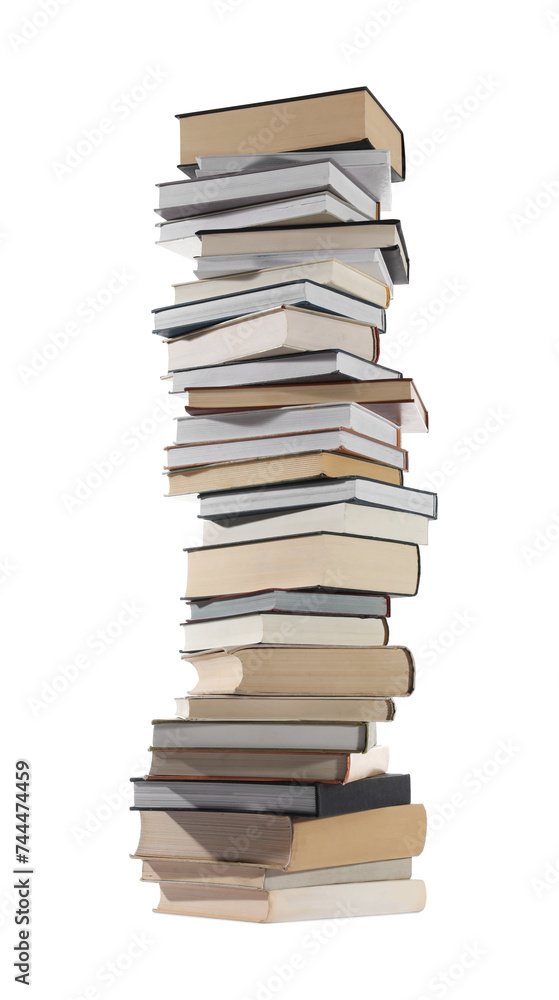 High stack of many different books isolated on white High stack of many different books isolated on white