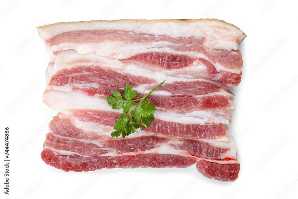 Pieces of raw pork belly and parsley isolated on white, top view