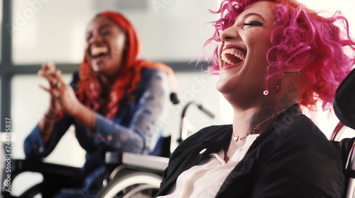 Inclusive image showing a happy smiling black African American disabled office LGBT colleague in a wheelchair