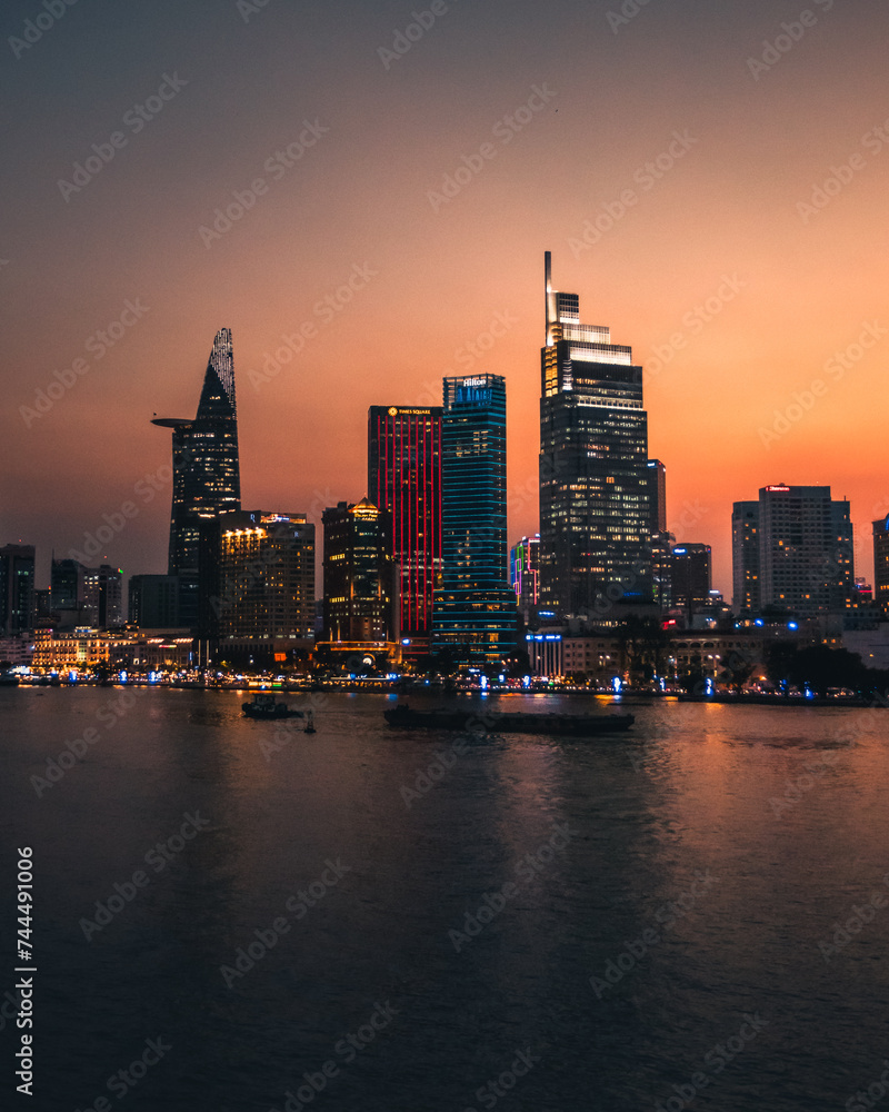 Fototapeta premium A sunset view of Ho Chi Minh city from over the Mekong river