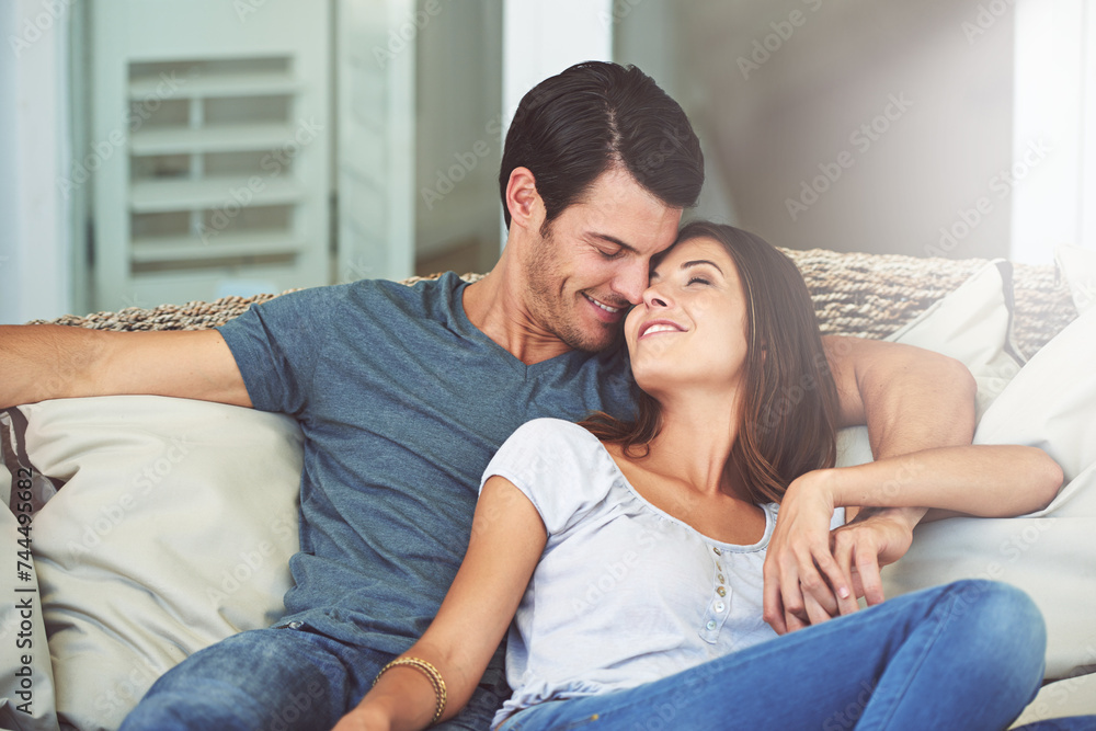 Love, smile and couple relaxing on sofa by patio cuddling and bonding for marriage at home. Happy, romance and young man and woman resting together on couch by outdoor porch of modern house. Love, smile and couple relaxing on sofa by patio cuddling and bonding for marriage at home. Happy, romance and young man and woman resting together on couch by outdoor porch of modern house.