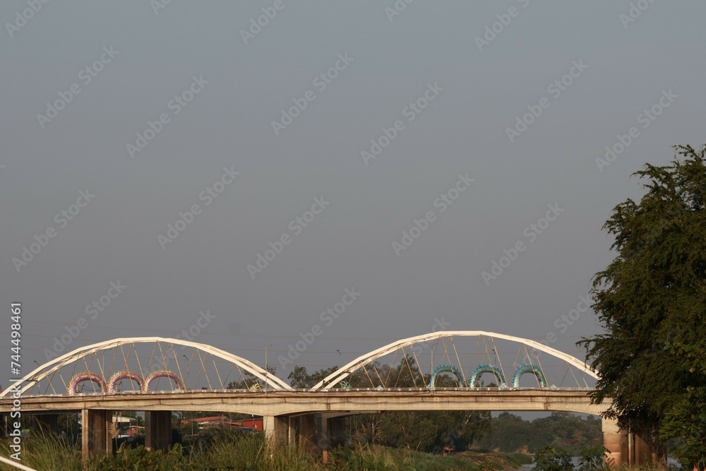 Fototapeta premium rainbow bridge over the river