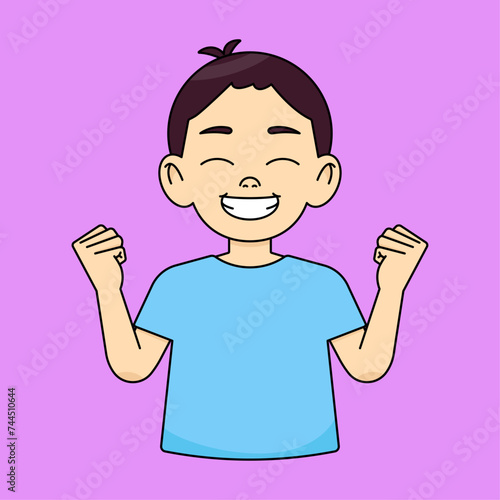 The boy happily clenches his fists in the air, smiles happily, keeps his eyes closed, celebrates success, enjoys victory