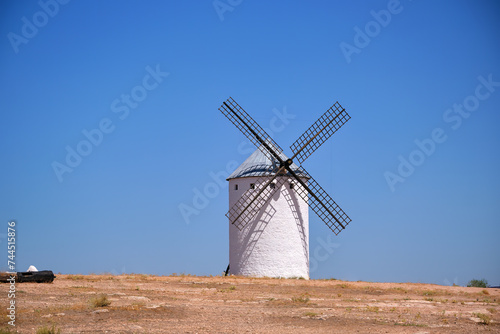 Tableau sur toile Ancient windmill  in Campo de Criptana, Spain, defined in Cervantes' Don Quixote
