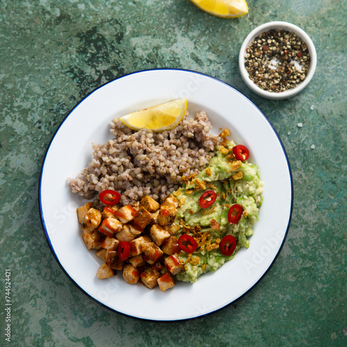 Green buckwheat with chicken and avocado mash