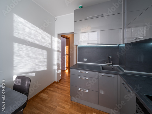 KItchen in the modern flat. Light from the window.