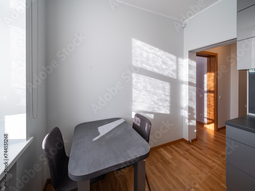 KItchen in the modern flat. Light from the window.