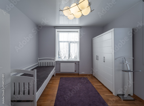 Living room in the modern flat. Lighti from th ewindow.