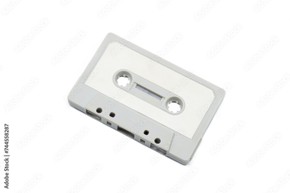 close up of vintage audio tape cassette blank and empty to add your own words and design. isolated on white background with clipping path top view