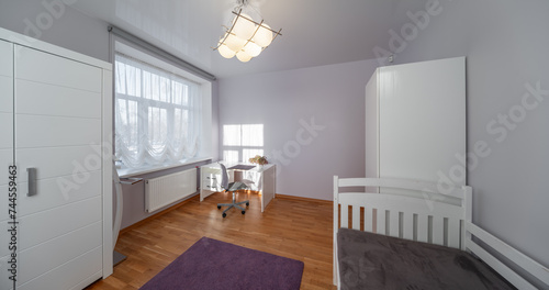 Living room in the modern flat. Lighti from th ewindow.