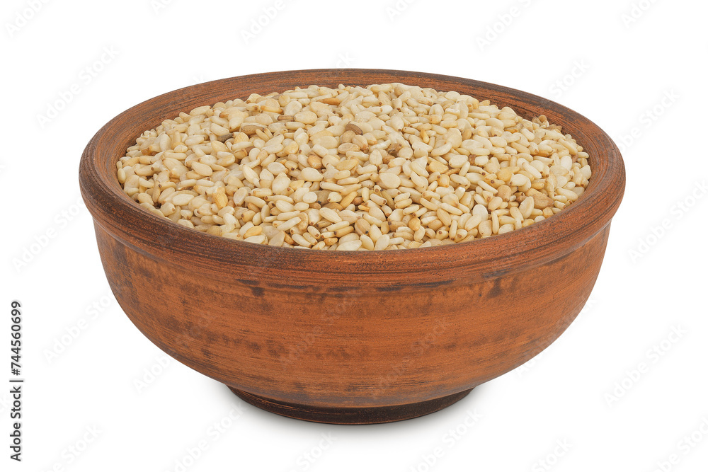 Sesame seeds in ceramic bowl isolated on white background with full depth of field Sesame seeds in ceramic bowl isolated on white background with full depth of field