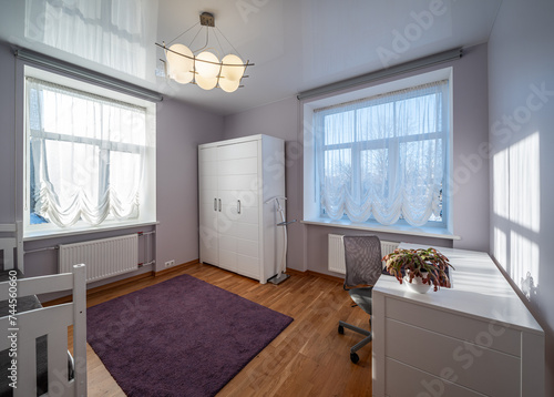 Living room in the modern flat. Lighti from th ewindow.