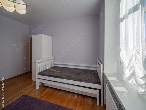 Living room in the modern flat. Lighti from th ewindow.