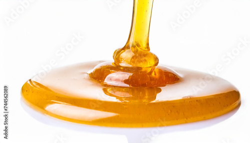 Sweet honey spill drip isolated on white background © Giuseppe Cammino