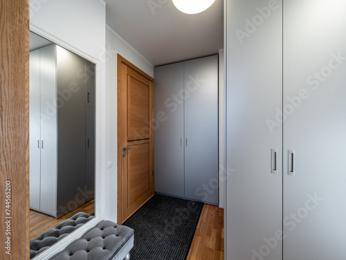 Living room in the modern flat. Lighti from th ewindow.