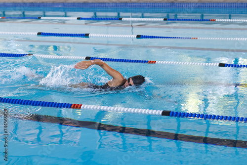 Swimmer in action at a competitive pool event
