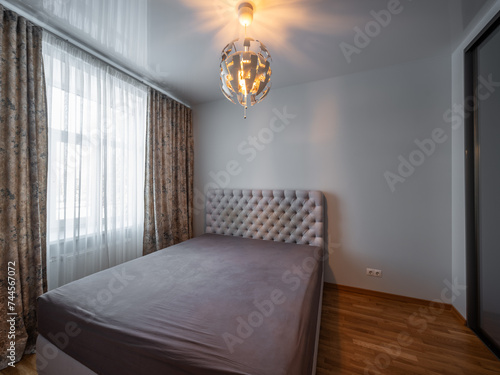 Bedroom in the modern flat.
