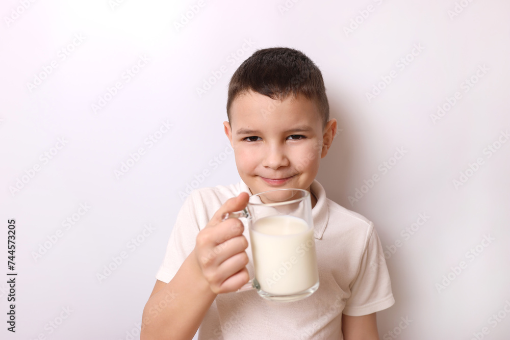 The boy tasted delicious milk. Children's healthy food. The boy tasted delicious milk. Children's healthy food.