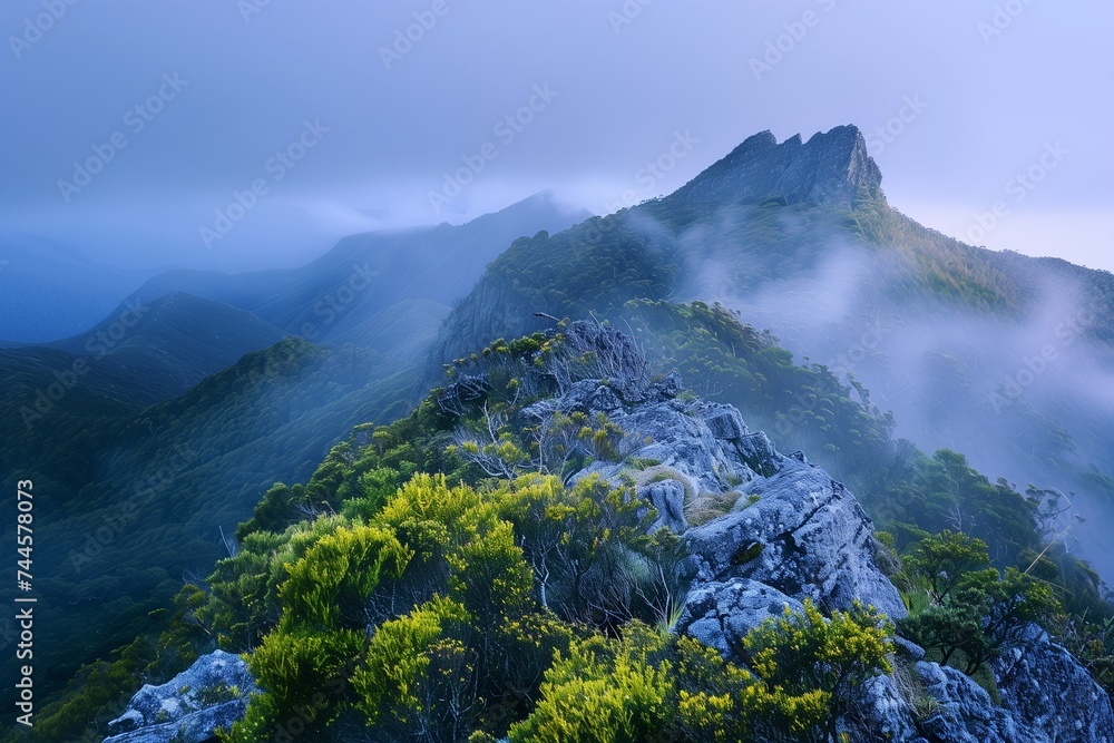 Wisps of mist caress a mountain peak, shrouding love's whispered secrets in ethereal veils.