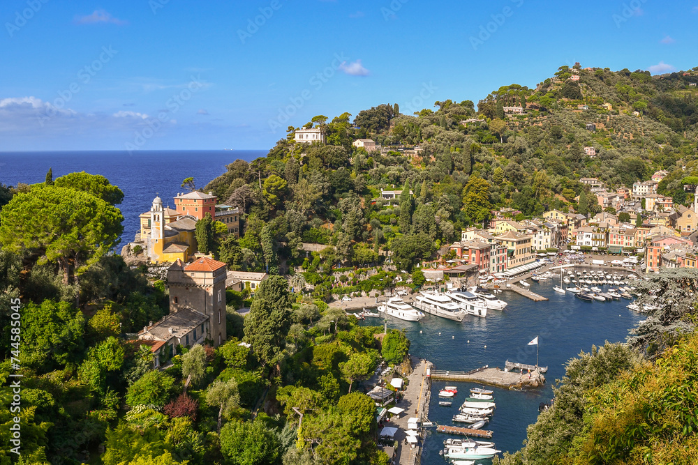 Elevated view of the famous holiday resort with the small harbour on the Italian Riviera in summer, Portofino, Genoa, Liguria, Italy	