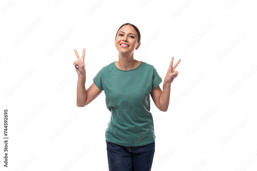 young friendly brunette woman in a t-shirt smiling at the camera on a white background young friendly brunette woman in a t-shirt smiling at the camera on a white background