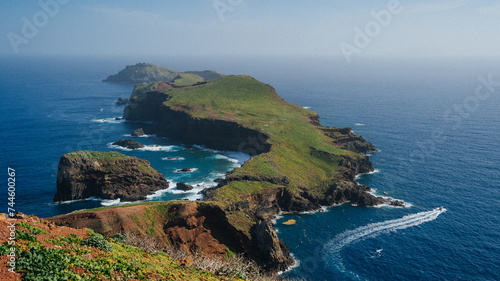 Lighthouse of the Ponta de São Lourenço (tip of St Lawrence) on a desertic islet at the easternmost point of Madeira island (Portugal) in the Atlantic Ocean photo