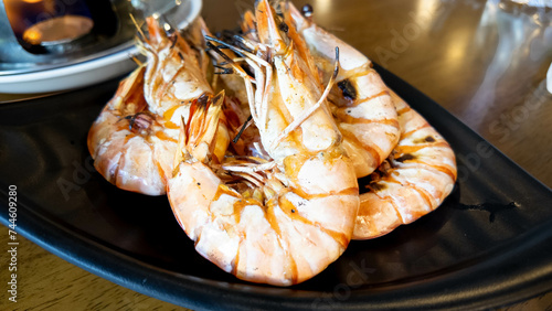 seafood meal prawn grilled river dinner shimp lunch delicious restaurant cooked fresh healthy gourmet ingredient animal giant meat thailand roasted tasty luxury lobster bar b q food cuisine eat health photo