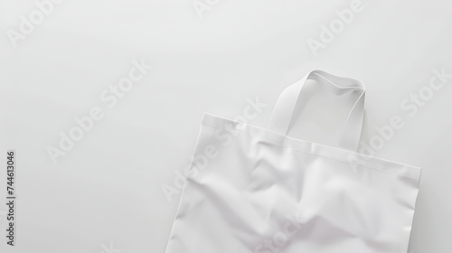 White tote bag mockup on a grey background with copyspace.