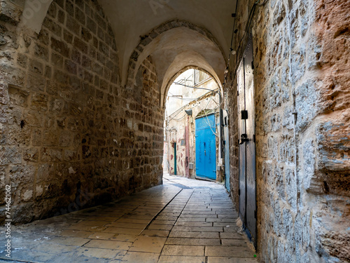narrow street in the town, Old streets of ancient Acre, Akko, Israel	
