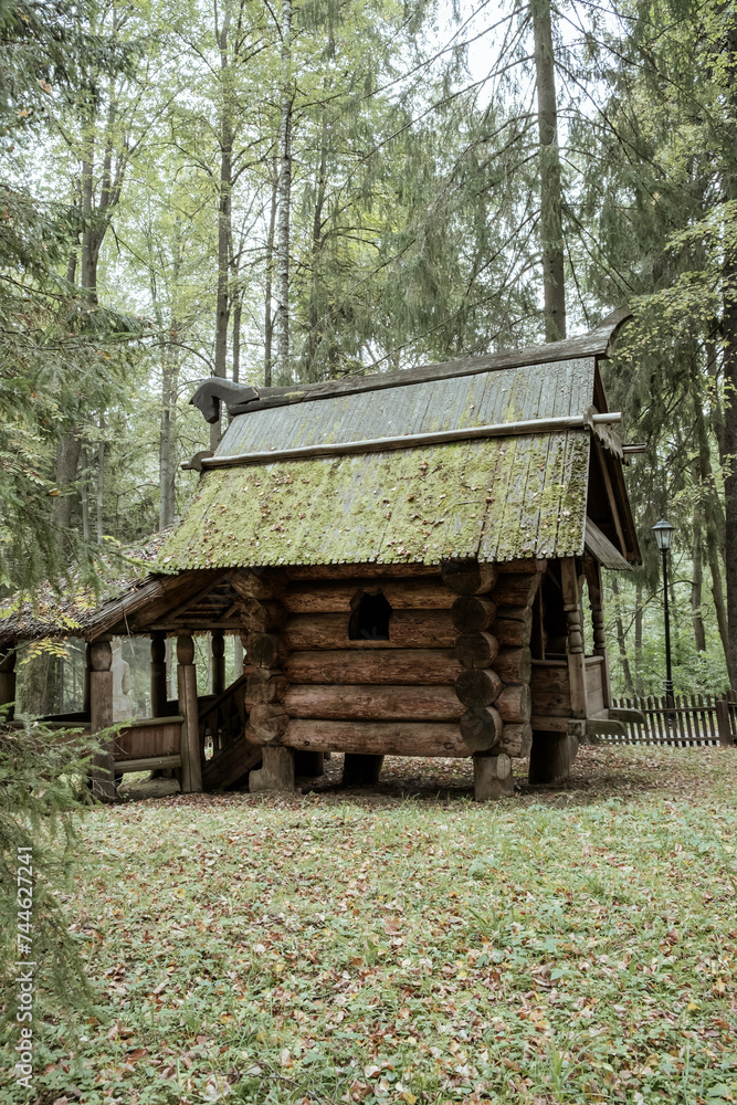 Old log house in the forest. Old log house in the forest.