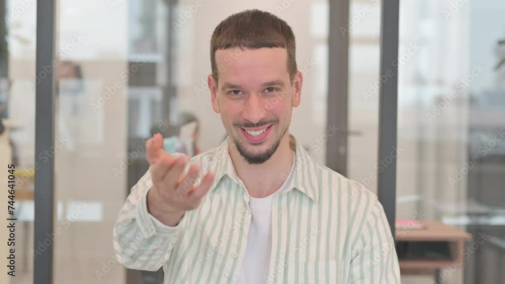 Portrait of Confident Creative Young Man inviting People Portrait of Confident Creative Young Man inviting People