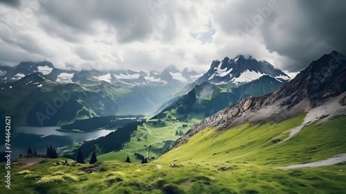 Panoramic view of the mountains and the lake in the clouds