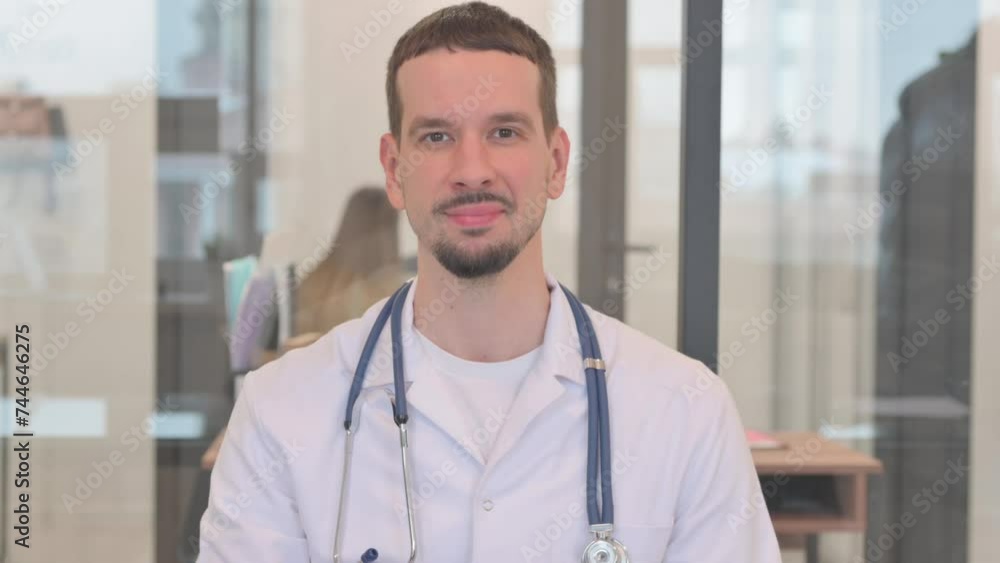Portrait of Middle Aged Doctor with Call Me Gesture Portrait of Middle Aged Doctor with Call Me Gesture