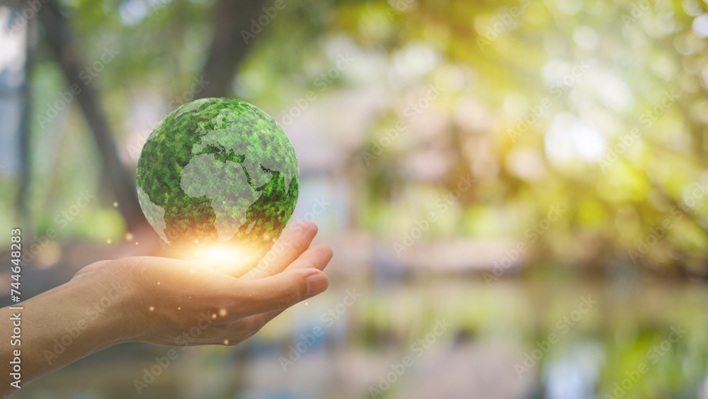Sustainable Environment concept. Green earth planet in hands with shining light. Save and protection Earth. the Environment World Earth Day. Sustainable Environment concept. Green earth planet in hands with shining light. Save and protection Earth. the Environment World Earth Day.