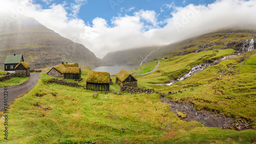 Saksun, Faroe Islands; February 24, 2023 - Saksun is a remote little village on Streymoy island in the Faroe Islands. The village is famous for its unique location and its  many waterfalls. photo