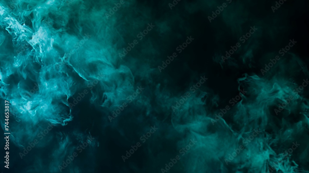 Dense multicolored smoke of  blue and green colors on a black isolated background
