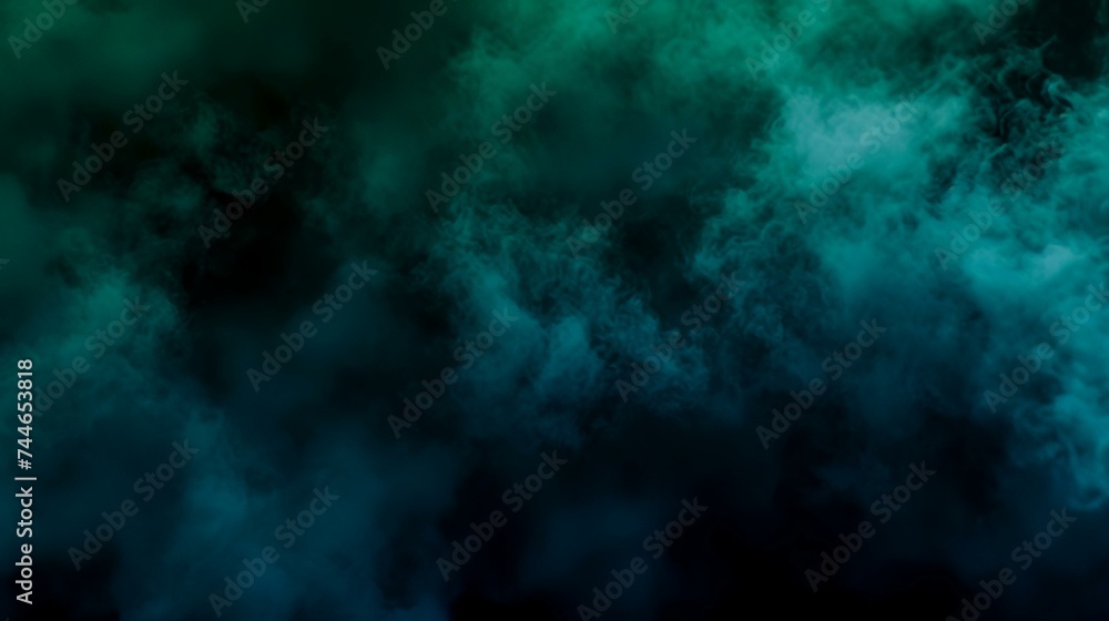 Dense multicolored smoke of  blue and green colors on a black isolated background