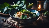 Asian vegetarian food udon noodles with bok choy. Traditional Japanese cuisine.