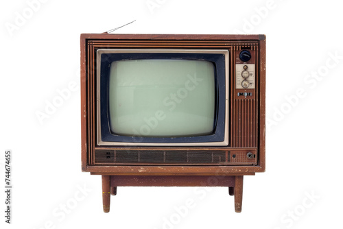 Old TV on Wooden Stand. An image of an antique television set placed on top of a sturdy wooden stand in a well lit room.