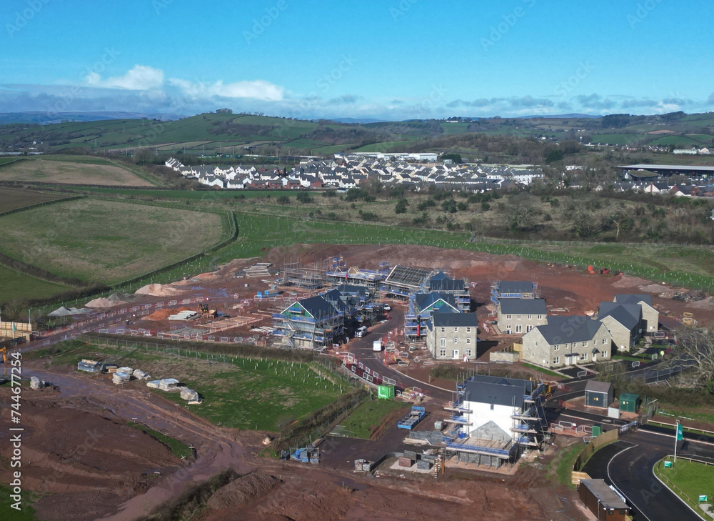 Paignton, South Devon, England: DRONE VIEW: A new build house development under construction on green belt land at White Rock. Paignton is a popular UK holiday resort (PHOTO 3). Paignton, South Devon, England: DRONE VIEW: A new build house development under construction on green belt land at White Rock. Paignton is a popular UK holiday resort (PHOTO 3).