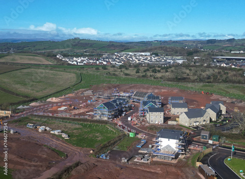 Paignton, South Devon, England: DRONE VIEW: A new build house development under construction on green belt land at White Rock. Paignton is a popular UK holiday resort (PHOTO 3).