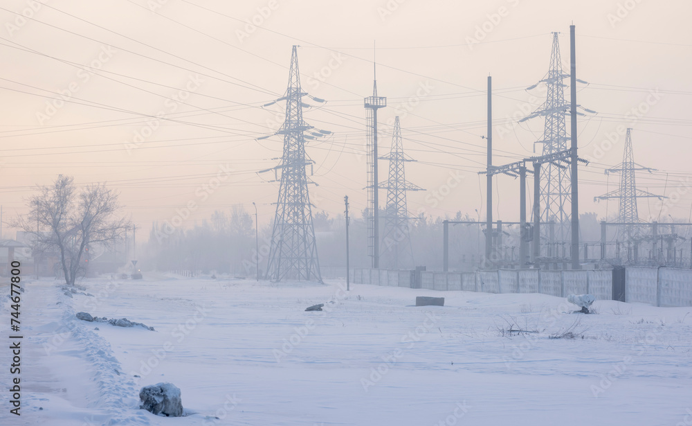 high power lines in the fog in winter
high power lines in the fog in winter